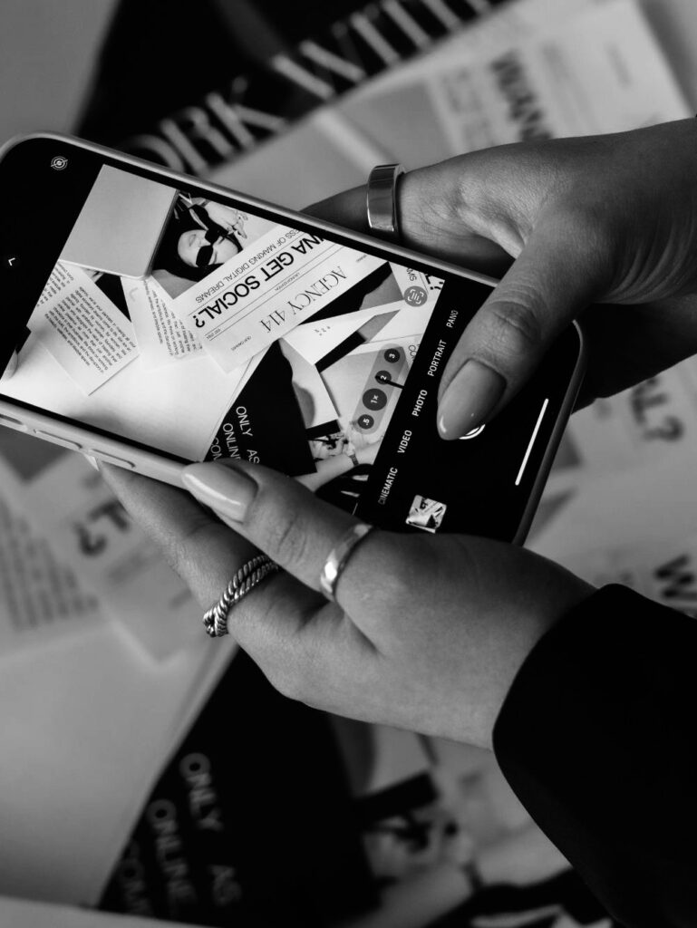 phone taking a picture of papers